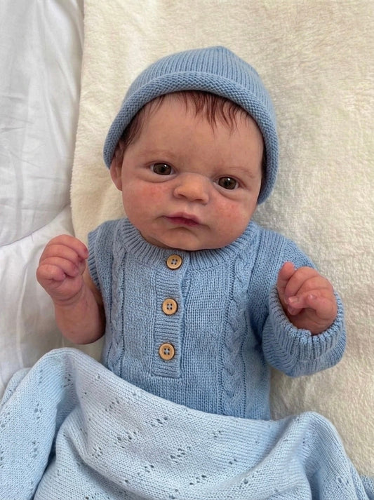 Muñeco Reborn Realista Ryan Ojos abiertos  Niño  50cm y 1.700 kg + Pack Premium